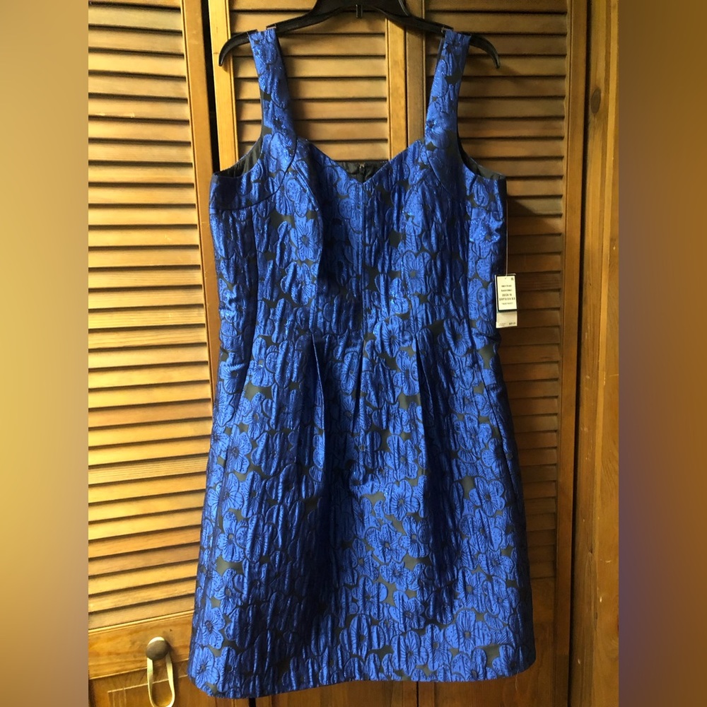 Beautiful holiday party or special occasion dress with great detail and sparkle